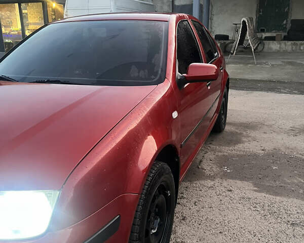 Красный Фольксваген Бора, объемом двигателя 1.4 л и пробегом 220 тыс. км за 3200 $, фото 2 на Automoto.ua