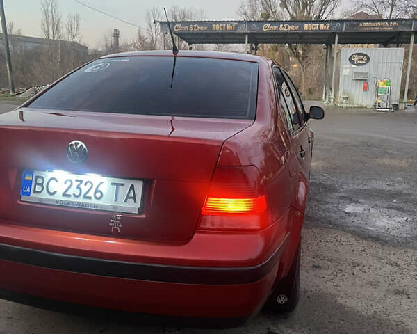 Красный Фольксваген Бора, объемом двигателя 1.4 л и пробегом 220 тыс. км за 3200 $, фото 6 на Automoto.ua