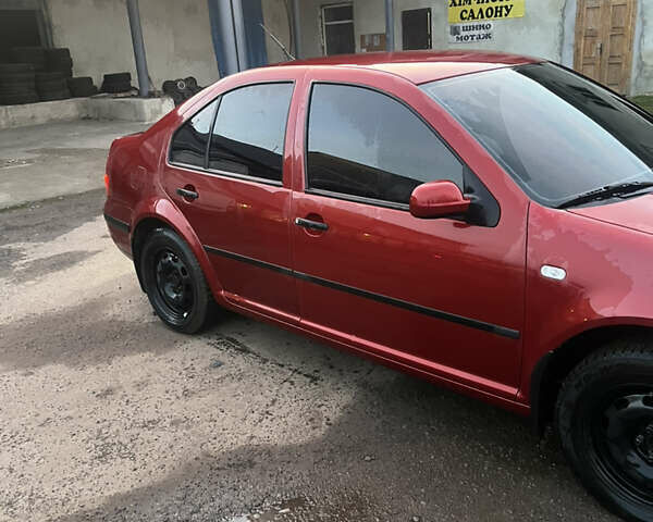 Красный Фольксваген Бора, объемом двигателя 1.4 л и пробегом 220 тыс. км за 3200 $, фото 4 на Automoto.ua