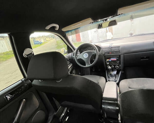 Сірий Фольксваген Бора, об'ємом двигуна 1.6 л та пробігом 388 тис. км за 5100 $, фото 11 на Automoto.ua