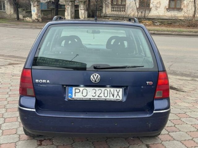Синій Фольксваген Бора, об'ємом двигуна 1.9 л та пробігом 300 тис. км за 1999 $, фото 4 на Automoto.ua