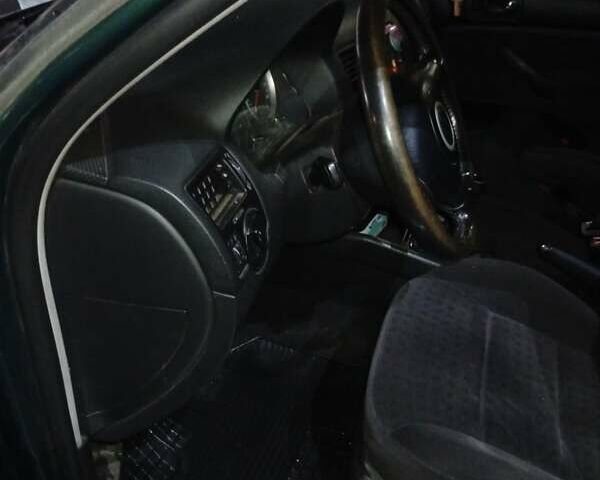 Зеленый Фольксваген Бора, объемом двигателя 1.6 л и пробегом 266 тыс. км за 4800 $, фото 7 на Automoto.ua