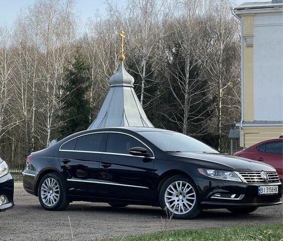 Чорний Фольксваген CC / Passat CC, об'ємом двигуна 2 л та пробігом 210 тис. км за 11249 $, фото 1 на Automoto.ua