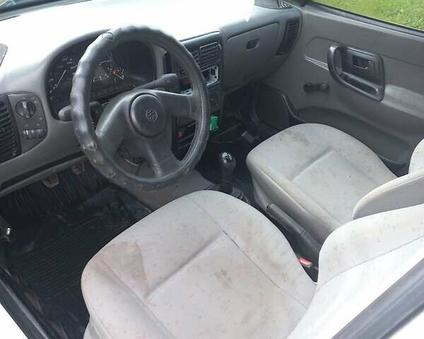 Белый Фольксваген Кадди, объемом двигателя 1.39 л и пробегом 285 тыс. км за 1900 $, фото 1 на Automoto.ua