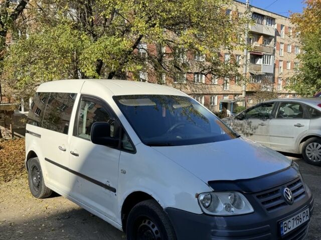 Белый Фольксваген Кадди, объемом двигателя 2 л и пробегом 400 тыс. км за 3800 $, фото 1 на Automoto.ua