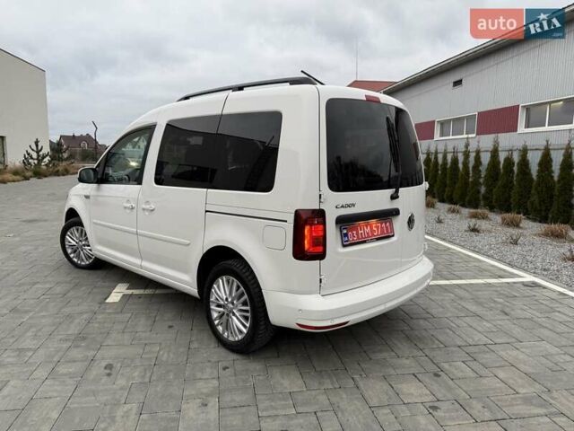 Белый Фольксваген Кадди, объемом двигателя 2 л и пробегом 150 тыс. км за 21600 $, фото 1 на Automoto.ua