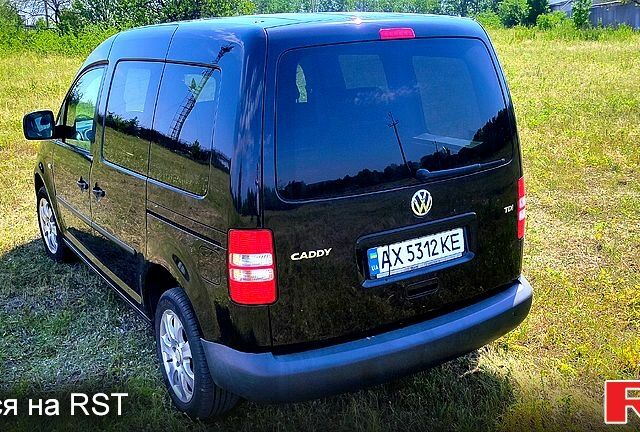 Черный Фольксваген Кадди, объемом двигателя 1.6 л и пробегом 275 тыс. км за 9200 $, фото 7 на Automoto.ua