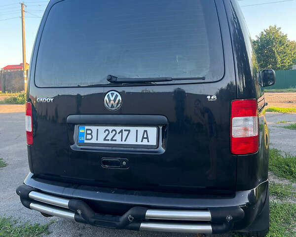 Черный Фольксваген Кадди, объемом двигателя 1.6 л и пробегом 213 тыс. км за 5799 $, фото 5 на Automoto.ua