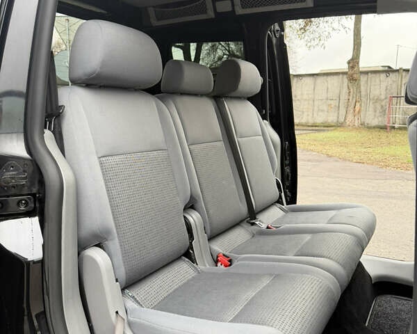 Черный Фольксваген Кадди, объемом двигателя 1.6 л и пробегом 233 тыс. км за 7650 $, фото 48 на Automoto.ua