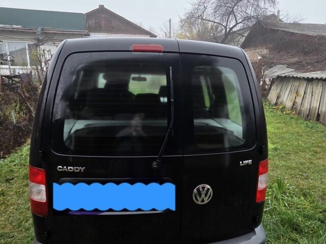 Черный Фольксваген Кадди, объемом двигателя 1.4 л и пробегом 142 тыс. км за 7999 $, фото 6 на Automoto.ua