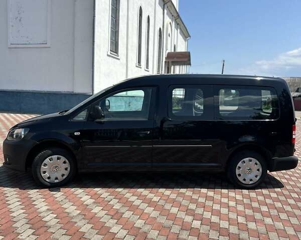 Черный Фольксваген Кадди, объемом двигателя 1.6 л и пробегом 249 тыс. км за 10199 $, фото 1 на Automoto.ua