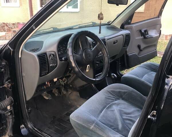 Черный Фольксваген Кадди, объемом двигателя 1.9 л и пробегом 177 тыс. км за 2400 $, фото 7 на Automoto.ua