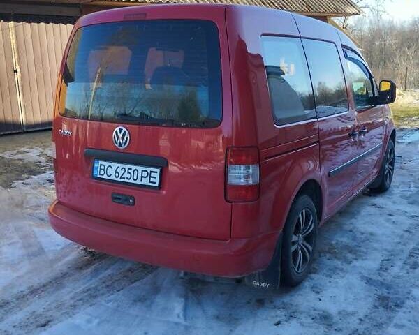 Красный Фольксваген Кадди, объемом двигателя 2 л и пробегом 290 тыс. км за 5500 $, фото 1 на Automoto.ua