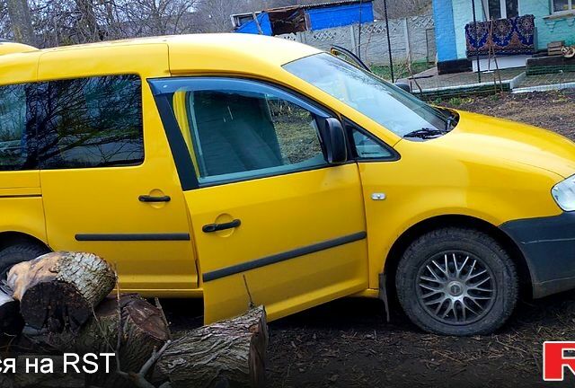 Желтый Фольксваген Кадди, объемом двигателя 2 л и пробегом 180 тыс. км за 5500 $, фото 1 на Automoto.ua