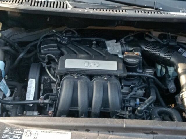 Серый Фольксваген Кадди, объемом двигателя 1 л и пробегом 228 тыс. км за 8200 $, фото 7 на Automoto.ua