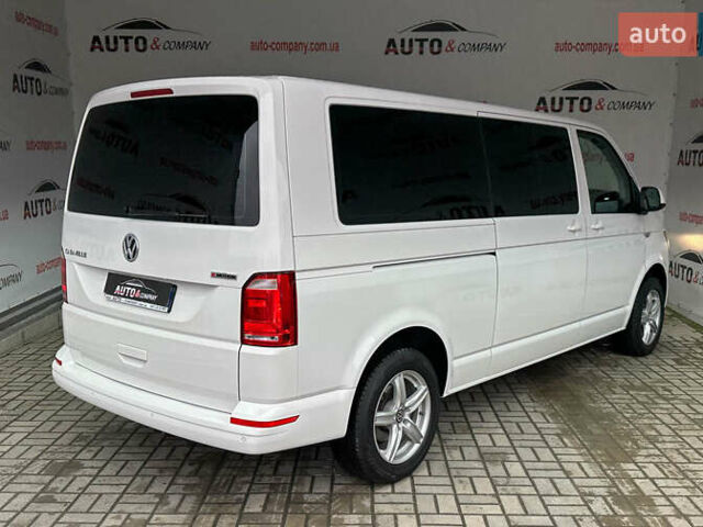 Белый Фольксваген Каравелла, объемом двигателя 2 л и пробегом 159 тыс. км за 32950 $, фото 2 на Automoto.ua