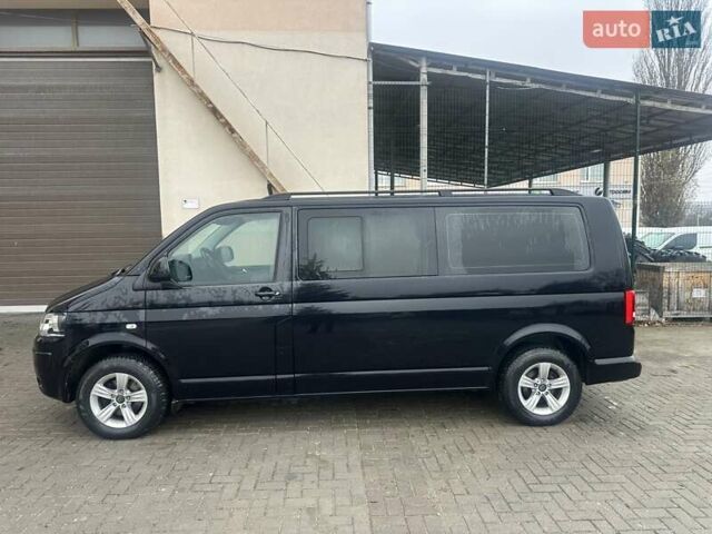 Черный Фольксваген Каравелла, объемом двигателя 2 л и пробегом 345 тыс. км за 13500 $, фото 1 на Automoto.ua
