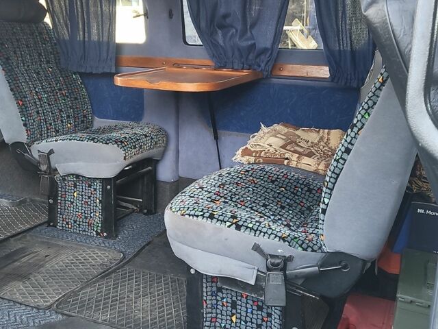 Серый Фольксваген Каравелла, объемом двигателя 2.5 л и пробегом 970 тыс. км за 4800 $, фото 7 на Automoto.ua