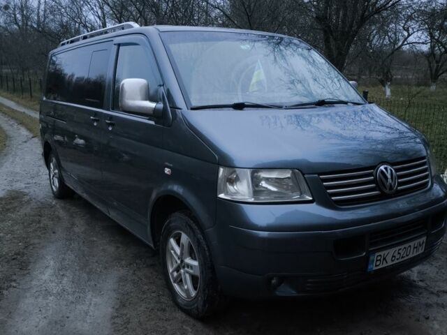 Серый Фольксваген Каравелла, объемом двигателя 2.5 л и пробегом 420 тыс. км за 9800 $, фото 6 на Automoto.ua