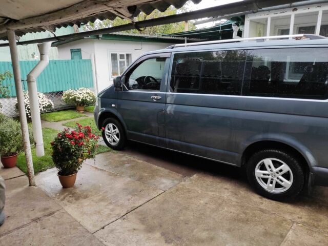 Серый Фольксваген Каравелла, объемом двигателя 2.5 л и пробегом 305 тыс. км за 11000 $, фото 5 на Automoto.ua