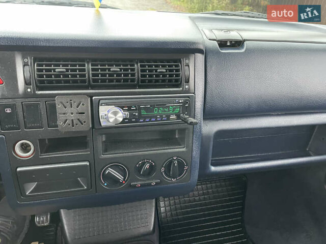 Зеленый Фольксваген Каравелла, объемом двигателя 2.5 л и пробегом 359 тыс. км за 8800 $, фото 32 на Automoto.ua