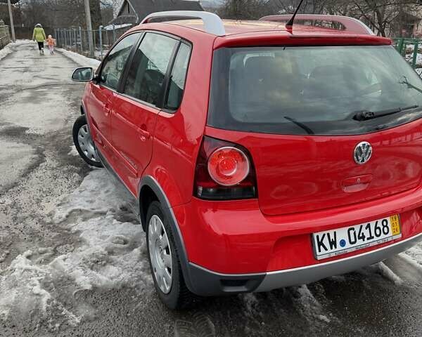 Червоний Фольксваген Кросс Поло, об'ємом двигуна 1.4 л та пробігом 165 тис. км за 6299 $, фото 15 на Automoto.ua