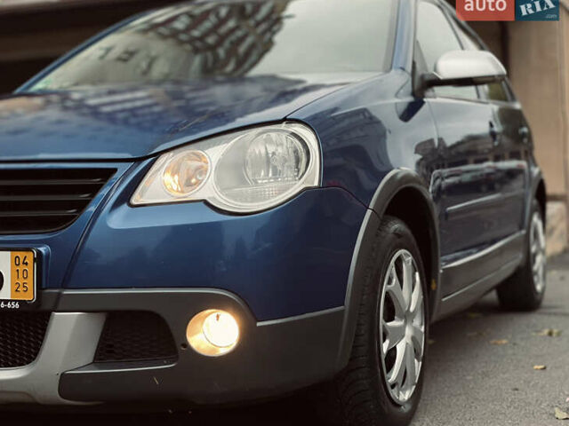 Синий Фольксваген Кросс Поло, объемом двигателя 1.4 л и пробегом 214 тыс. км за 5799 $, фото 11 на Automoto.ua
