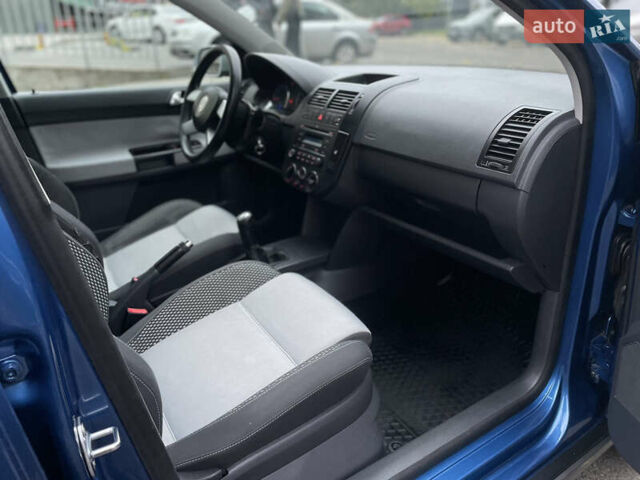 Синий Фольксваген Кросс Поло, объемом двигателя 1.4 л и пробегом 214 тыс. км за 5799 $, фото 24 на Automoto.ua