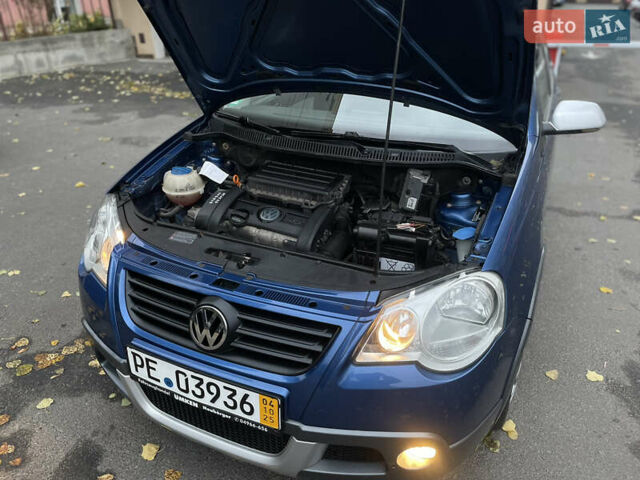 Синій Фольксваген Кросс Поло, об'ємом двигуна 1.4 л та пробігом 214 тис. км за 5799 $, фото 38 на Automoto.ua