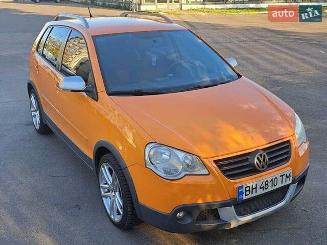 Оранжевый Фольксваген Кросс Поло, объемом двигателя 1.4 л и пробегом 238 тыс. км за 4900 $, фото 3 на Automoto.ua
