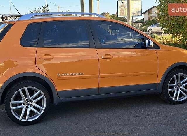Оранжевый Фольксваген Кросс Поло, объемом двигателя 1.4 л и пробегом 238 тыс. км за 4900 $, фото 18 на Automoto.ua