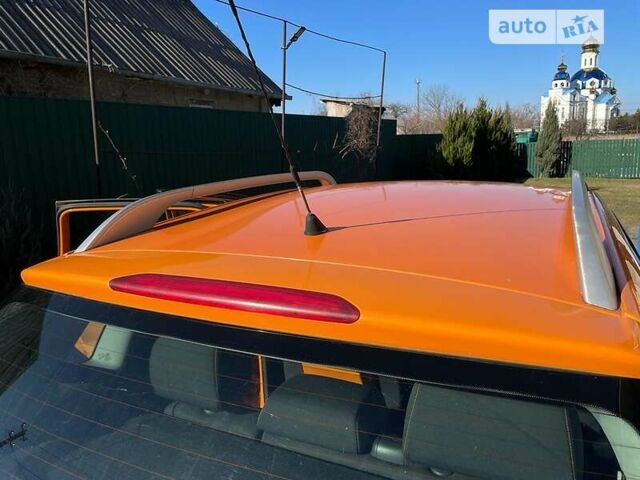 Оранжевый Фольксваген Кросс Поло, объемом двигателя 1.4 л и пробегом 81 тыс. км за 7000 $, фото 4 на Automoto.ua