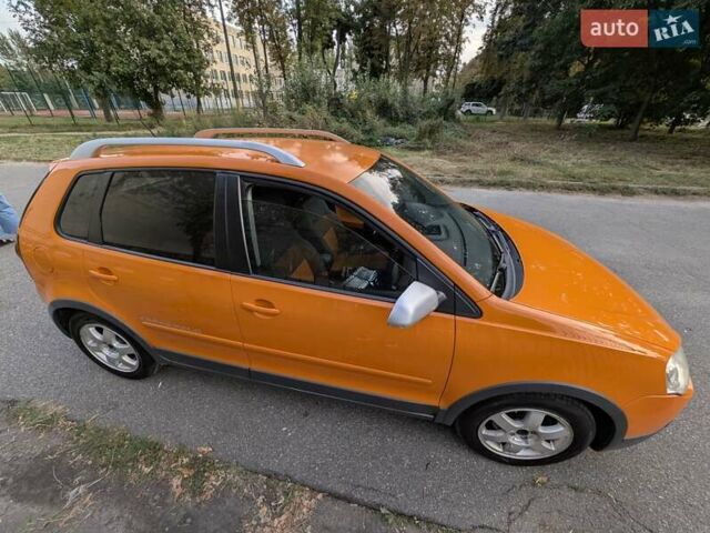 Помаранчевий Фольксваген Кросс Поло, об'ємом двигуна 1.4 л та пробігом 273 тис. км за 5000 $, фото 5 на Automoto.ua