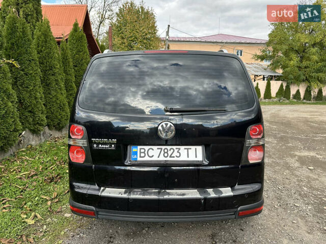Черный Фольксваген Кросс Туран, объемом двигателя 1.9 л и пробегом 333 тыс. км за 7500 $, фото 4 на Automoto.ua