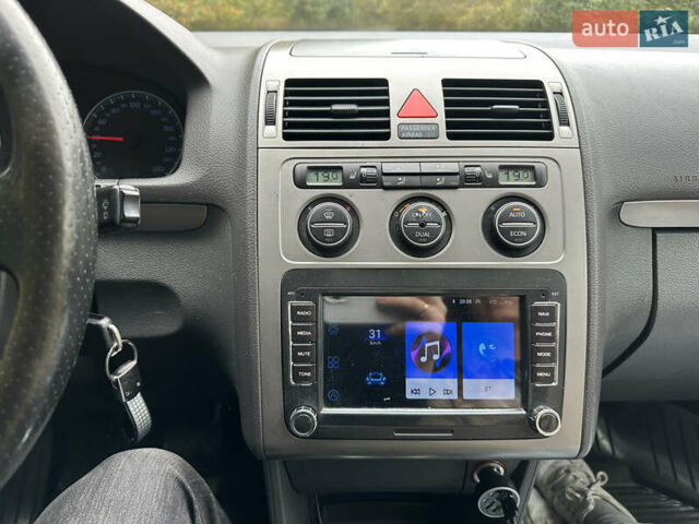 Черный Фольксваген Кросс Туран, объемом двигателя 1.9 л и пробегом 333 тыс. км за 7500 $, фото 17 на Automoto.ua