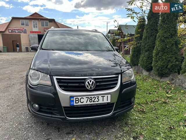 Черный Фольксваген Кросс Туран, объемом двигателя 1.9 л и пробегом 333 тыс. км за 7500 $, фото 1 на Automoto.ua
