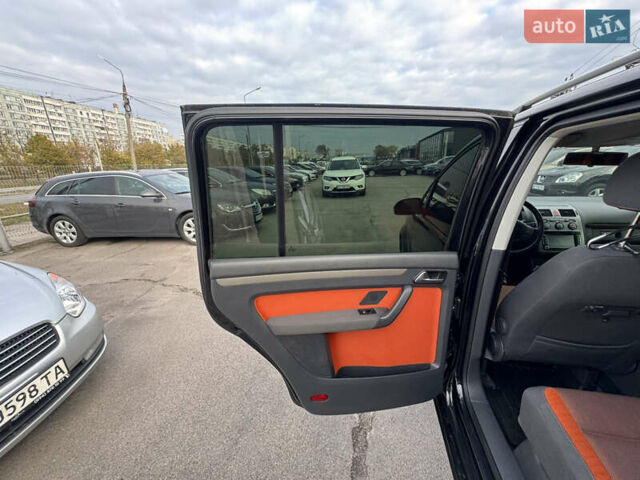 Черный Фольксваген Кросс Туран, объемом двигателя 1.9 л и пробегом 278 тыс. км за 7100 $, фото 26 на Automoto.ua