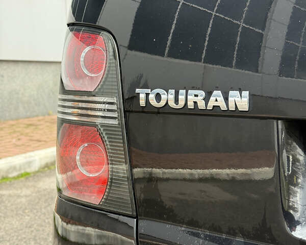 Черный Фольксваген Кросс Туран, объемом двигателя 0 л и пробегом 219 тыс. км за 8500 $, фото 76 на Automoto.ua