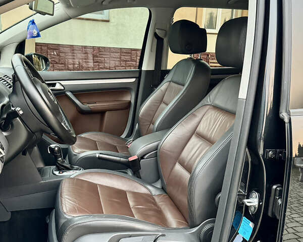 Черный Фольксваген Кросс Туран, объемом двигателя 2 л и пробегом 255 тыс. км за 12499 $, фото 24 на Automoto.ua