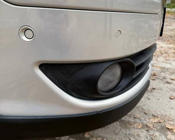 Сірий Фольксваген Кросс Туран, об'ємом двигуна 1.4 л та пробігом 159 тис. км за 8300 $, фото 3 на Automoto.ua