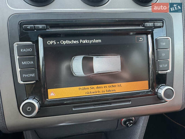 Оранжевый Фольксваген Кросс Туран, объемом двигателя 1.4 л и пробегом 232 тыс. км за 8300 $, фото 85 на Automoto.ua