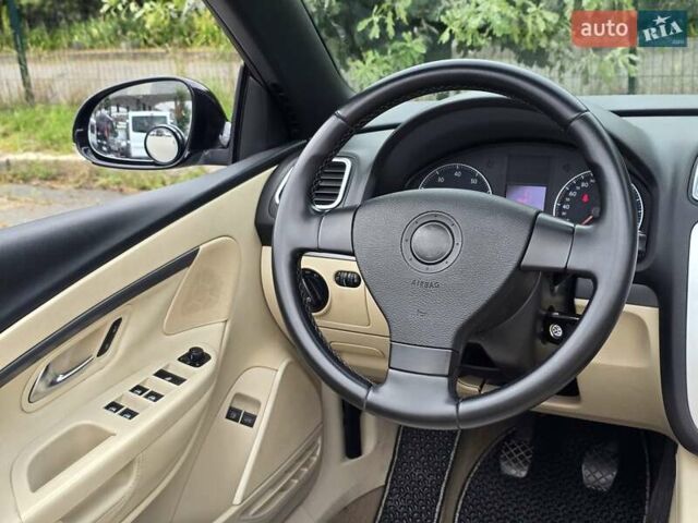 Чорний Фольксваген Еос, об'ємом двигуна 2 л та пробігом 124 тис. км за 6199 $, фото 48 на Automoto.ua