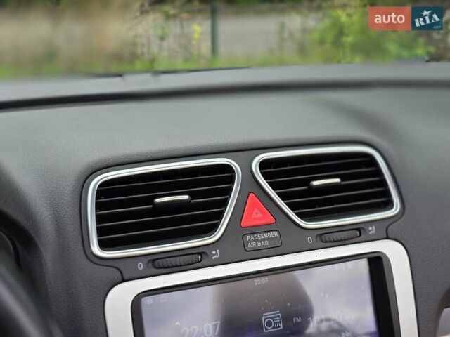 Чорний Фольксваген Еос, об'ємом двигуна 2 л та пробігом 124 тис. км за 6199 $, фото 57 на Automoto.ua