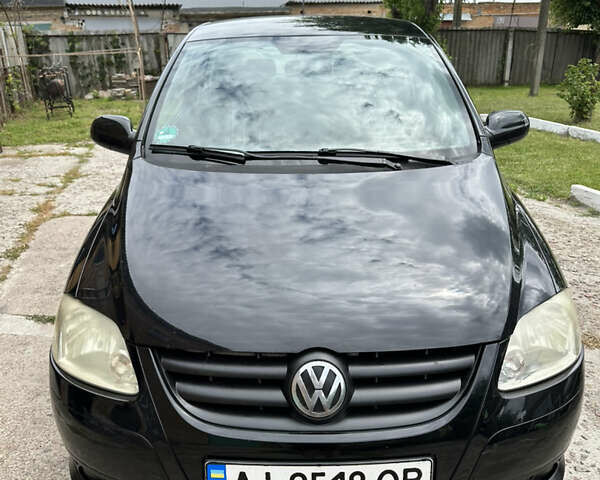 Черный Фольксваген Фокс, объемом двигателя 1.2 л и пробегом 245 тыс. км за 4000 $, фото 2 на Automoto.ua