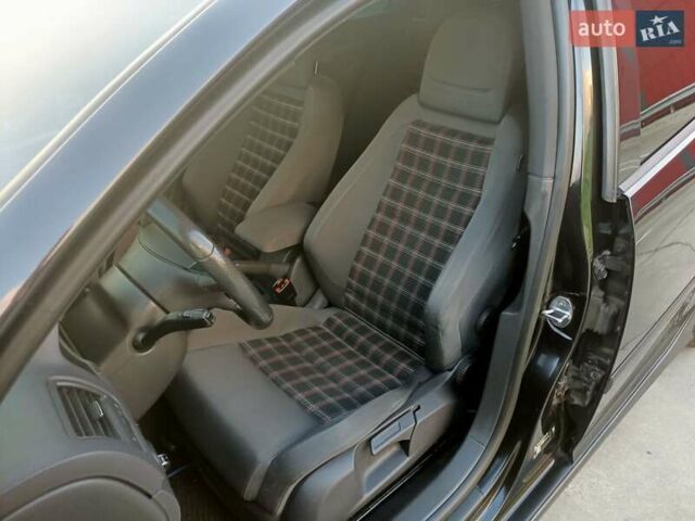 Черный Фольксваген Гольф ГТИ, объемом двигателя 2 л и пробегом 223 тыс. км за 9299 $, фото 9 на Automoto.ua