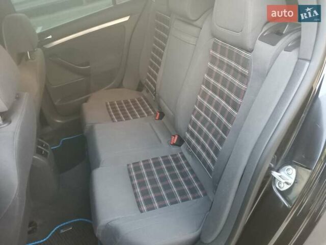 Черный Фольксваген Гольф ГТИ, объемом двигателя 2 л и пробегом 223 тыс. км за 9299 $, фото 11 на Automoto.ua