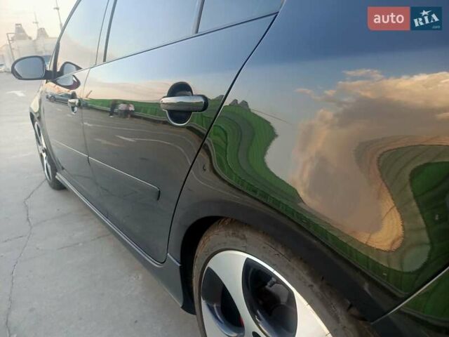 Черный Фольксваген Гольф ГТИ, объемом двигателя 2 л и пробегом 223 тыс. км за 9299 $, фото 21 на Automoto.ua