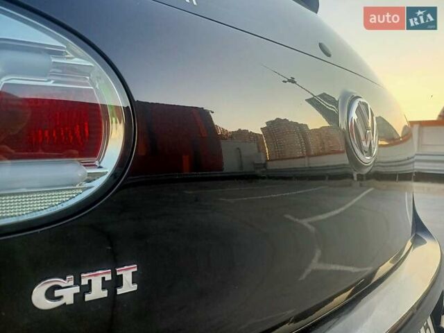 Черный Фольксваген Гольф ГТИ, объемом двигателя 2 л и пробегом 223 тыс. км за 9299 $, фото 17 на Automoto.ua