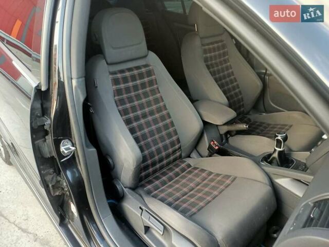 Черный Фольксваген Гольф ГТИ, объемом двигателя 2 л и пробегом 223 тыс. км за 9299 $, фото 10 на Automoto.ua