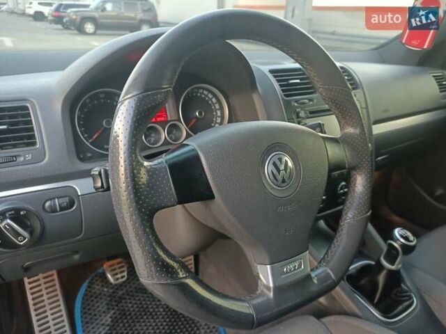 Черный Фольксваген Гольф ГТИ, объемом двигателя 2 л и пробегом 223 тыс. км за 9299 $, фото 22 на Automoto.ua